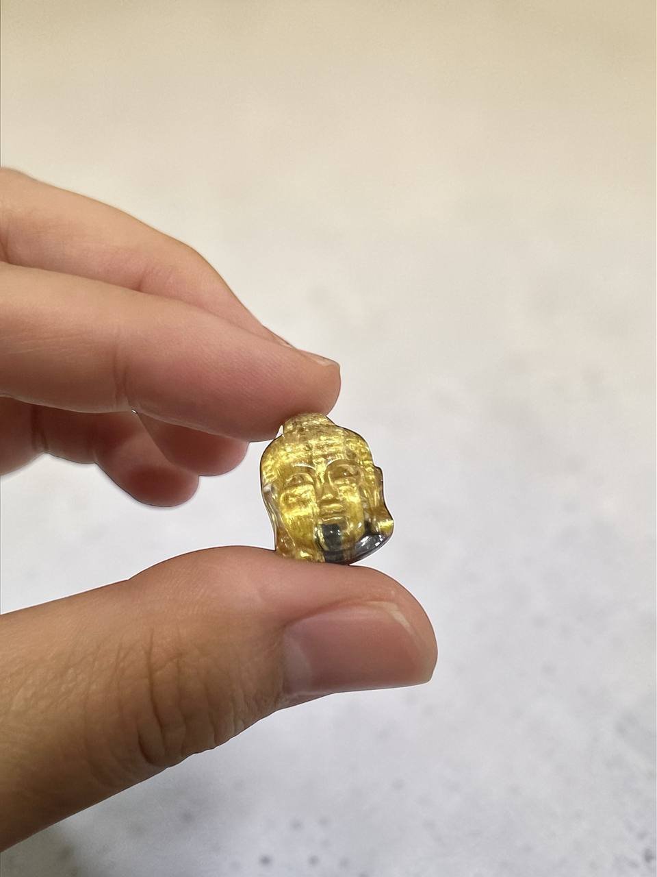 Gold Rutilated Quartz Buddha Head Carving